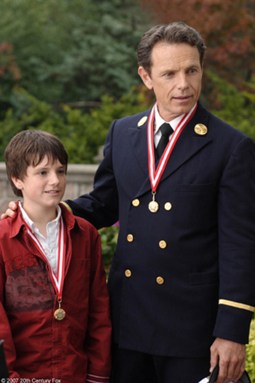 Fire chief Connor (Bruce Greenwood) and his son Shane (Josh Hutcherson) are newly medaled heroes in "Firehouse Dog."