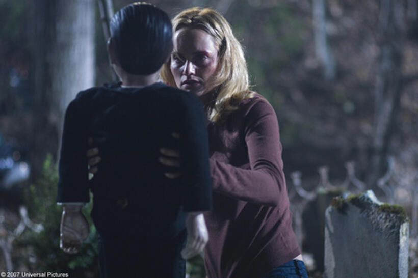 Ella (Amber Valletta) unearths ventriloquist dummy Billy from the grave in "Dead Silence."