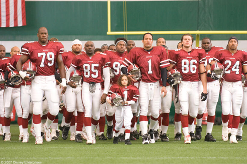 Madison Pettis and The Rock in "The Game Plan."