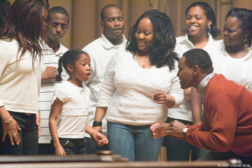 Jamia Simone Nash as Hope and Mykelti Williamson as Reverend James in "August Rush."