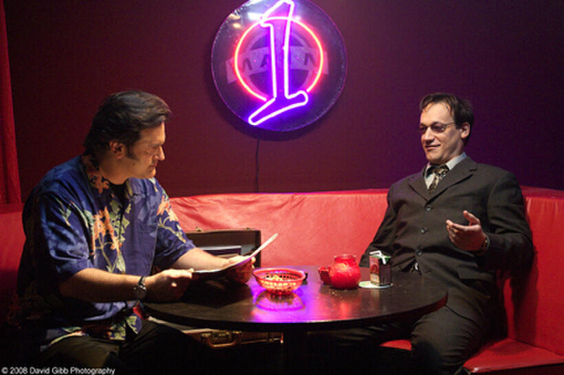 Bruce Campbell as himself and Ted Raimi as Wing in "My Name Is Bruce."