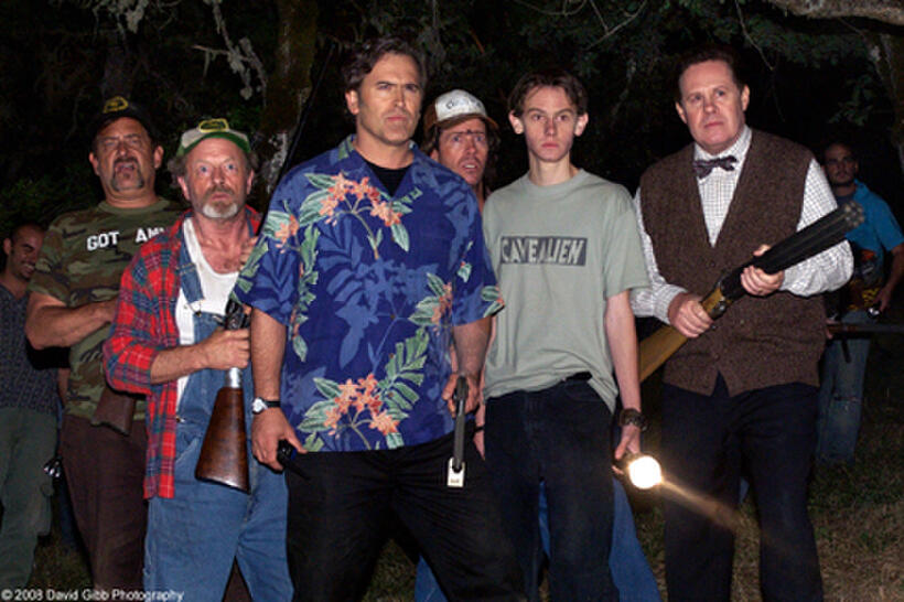 Bruce Campbell as himself, with townspeople, in "My Name Is Bruce."