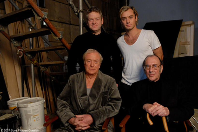 Director Kenneth Branagh, Jude Law, Michael Caine and screenwriter Harold Pinter on the set of "Sleuth."