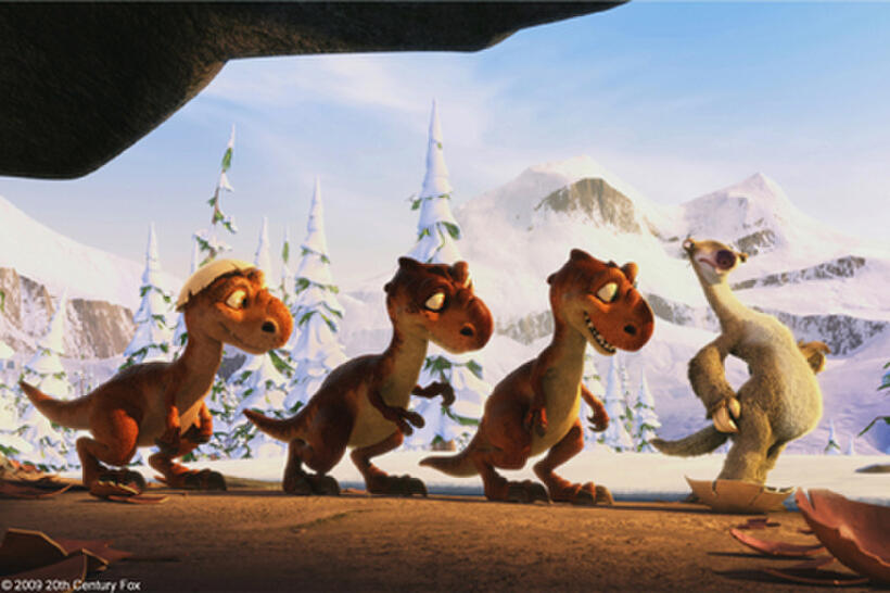 Three dinosaur hatchlings and Sid (voice of John Leguizamo) in "Ice Age: Dawn of the Dinosaurs."