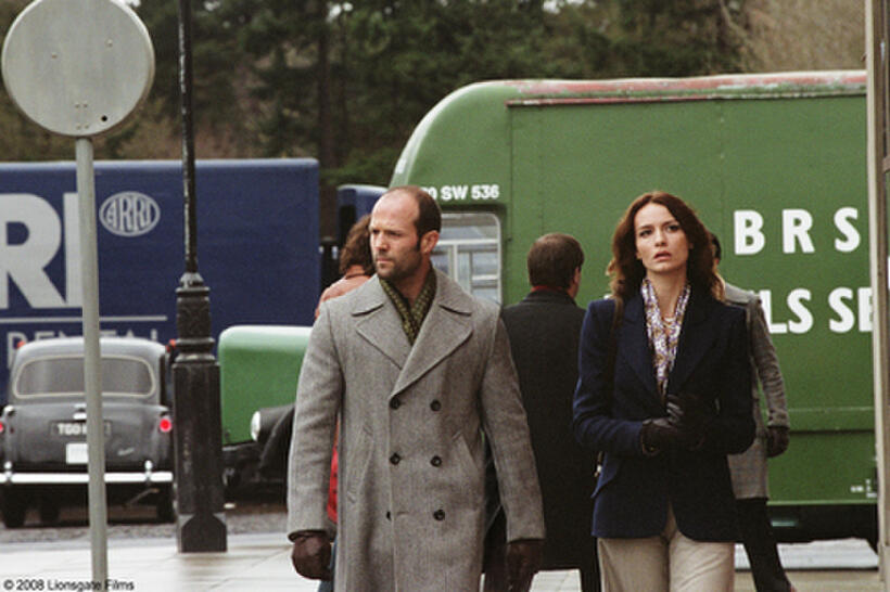 Jason Statham and Saffron Burrows in "The Bank Job."