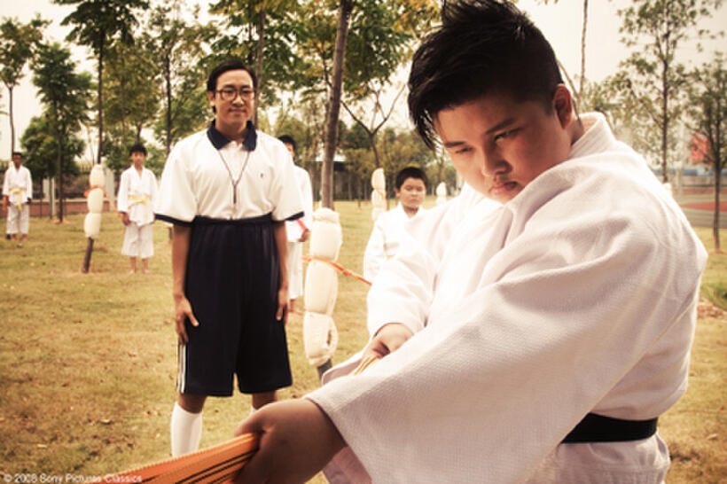 Fun Min Hun as P.E. Teacher and Yao Wen Xue as Storm Dragon in "CJ7."