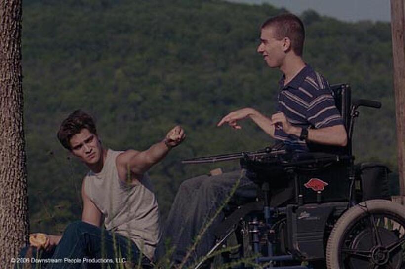 Luke Grimes as Enoch and Dan McCabe as Wheels in "War Eagle, Arkansas."