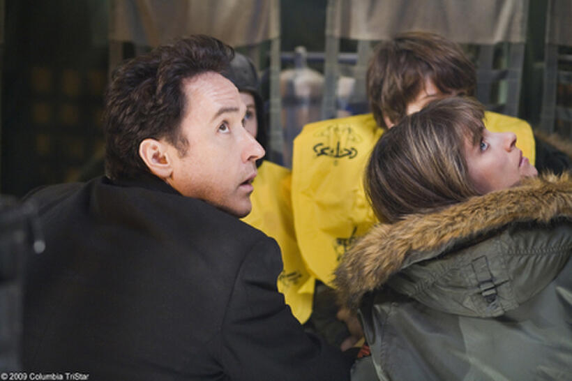 John Cusack as Jackson Curtis and Amanda Peet as Kate in "2012."