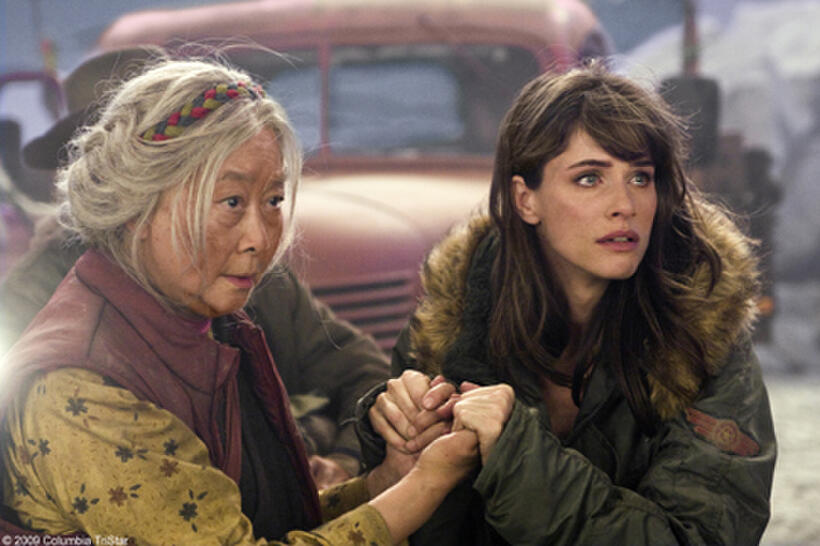 Lisa Wu as Grandmother Sonam and Amanda Peet as Kate in "2012."
