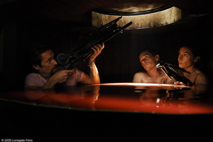 Willem Dafoe as Lionel ``Elvis'' Cormac, Ethan Hawke as Edward Dalton and Claudia Karvan as Audrey Bennett in "Daybreakers."