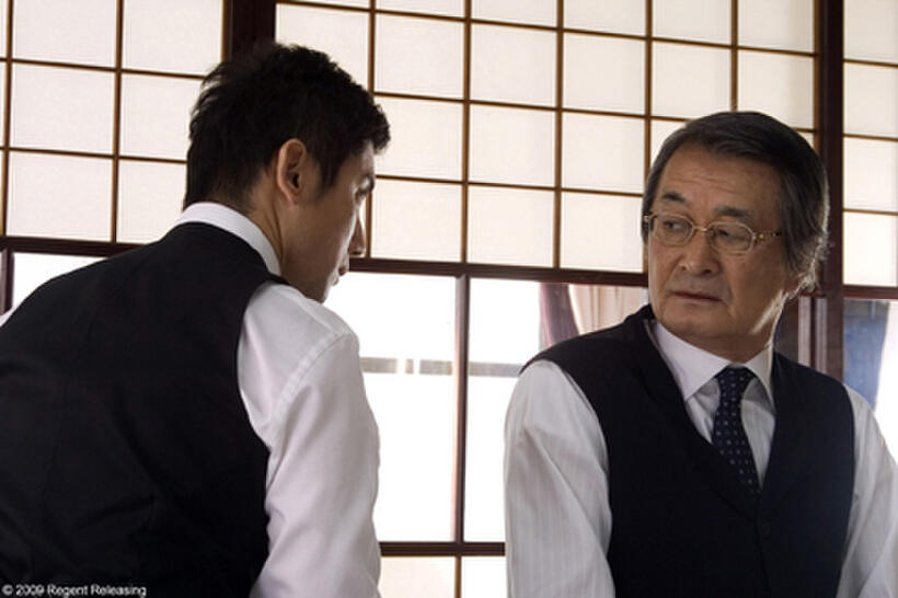 Masahiro Motoki as Daigo Kobayashi and Tsutomu Yamazaki as Sasaki in "Okuribito."