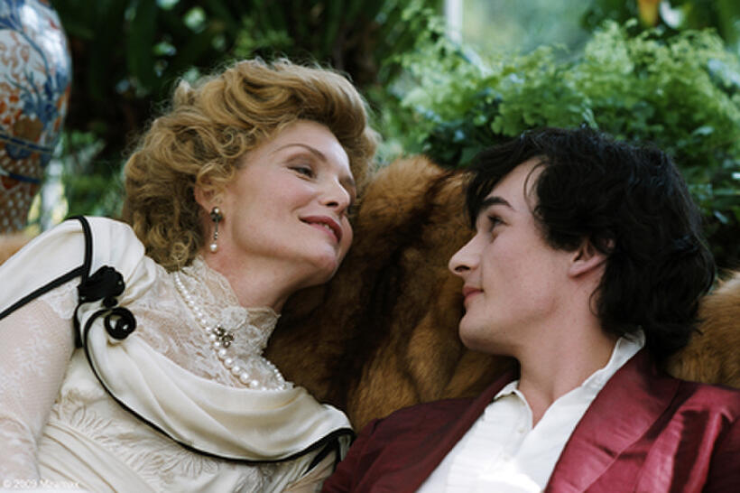 Michelle Pfeiffer as Lea de Lonval and Rupert Friend as Cheri in "Cheri."