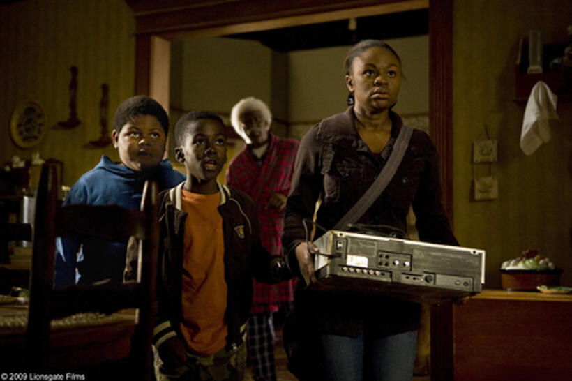 Freddy Siglar as Byron, Kwesi Boakye as Manny, Tyler Perry as Joe, and Hope Olaid? Wilson as Jennifer in "Tyler Perry's I Can Do Bad All By Myself."