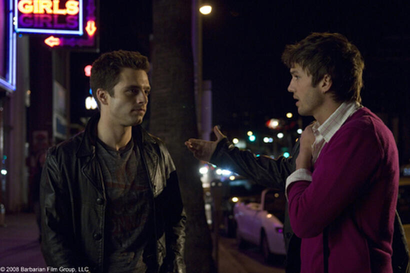 Sebastian Stan as Harry and Ashton Kutcher as Nikki in "Spread."