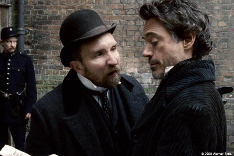 Eddie Marsan as Inspector Lestrade and Robert Downey Jr. as Sherlock Holmes in "Sherlock Holmes."