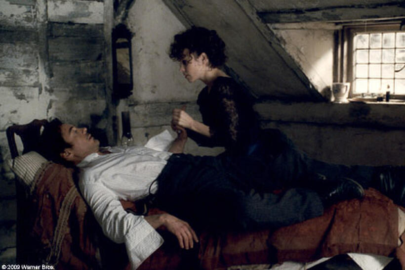 Robert Downey Jr. as Sherlock Holmes and Rachel McAdams as Irene Adler in "Sherlock Holmes."