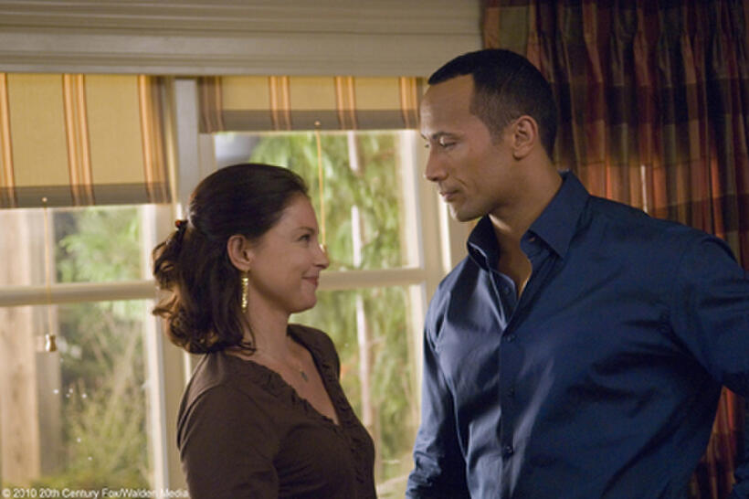 Ashley Judd as Carly and Dwayne Johnson as Derek in "Tooth Fairy."