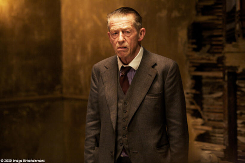 John Hurt as Old Man Peanut in "44 Inch Chest."