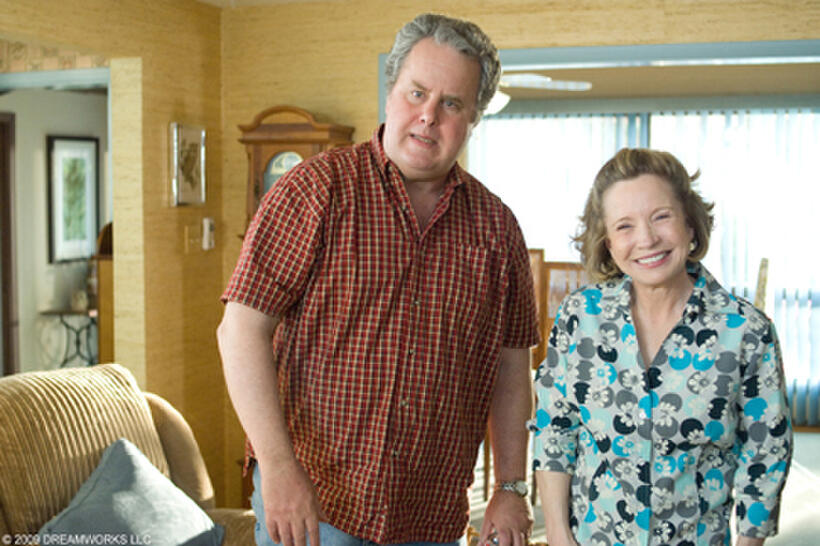 Adam LeFevre as Mr. Kettner and Debra Jo Rupp as Mrs. Kettner in "She's Out of My League."