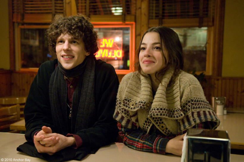 Jesse Eisenberg as Cheston and Olivia Thirlby as Cheston's girlfriend in "Solitary Man."