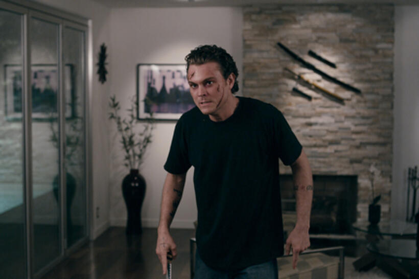 Clayne Crawford as John Taylor in ``The Perfect Host.''