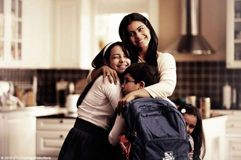 Kajol as Maya with Nominath Ginsburg as Ankush and Diya Sonecha as Anjali in "We Are Family."