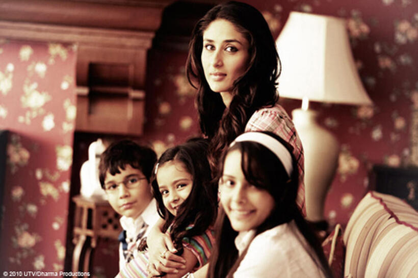 Kareena Kapoor as Shreya, with Aanchal Munjal as Aleya, Diya Sonecha as as Anjali and Nominath Ginsburg as Ankush in "We Are Family."
