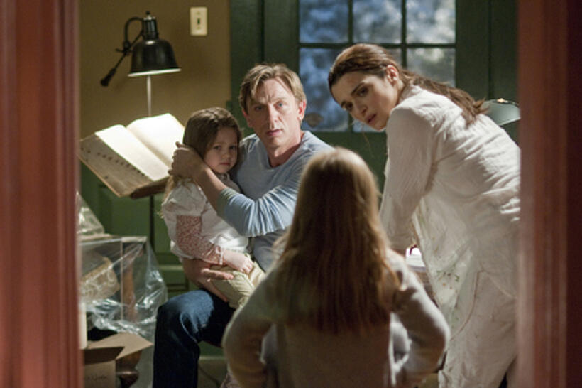 Claire Geare as Dee Dee, Daniel Craig as Will Atenton and Rachel Weisz as Libby Atenton in ``Dream House.''