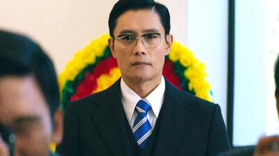 The Man Standing Next