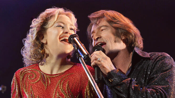 Hugh Jackman & Kate Hudson on Becoming Lightning & Thunder in ‘Song Sung Blue’