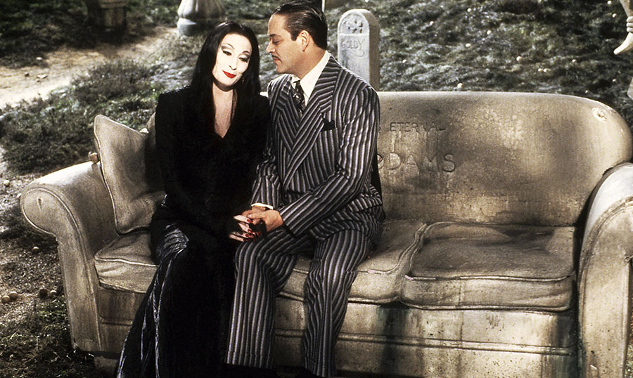 Anjelica Huston and Raul Julia in The Addams Family