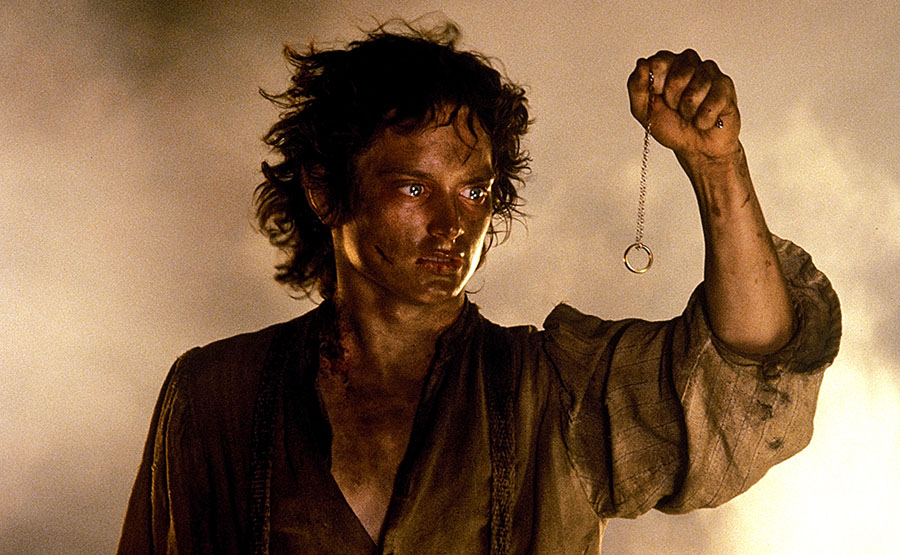 Elijah Woods as Frodo holds the one ring