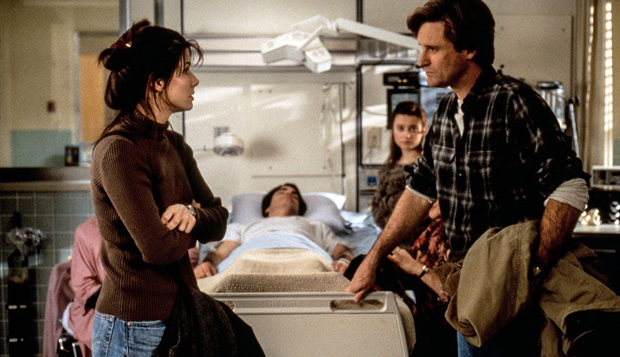 Sandra Bullock, Peter Gallagher and Bill Pullman in While You Were Sleeping