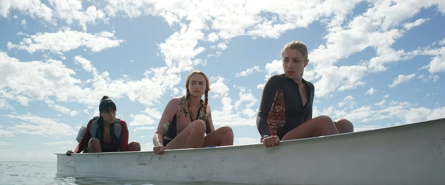 Three girls on a boat in The Reef: Stalked